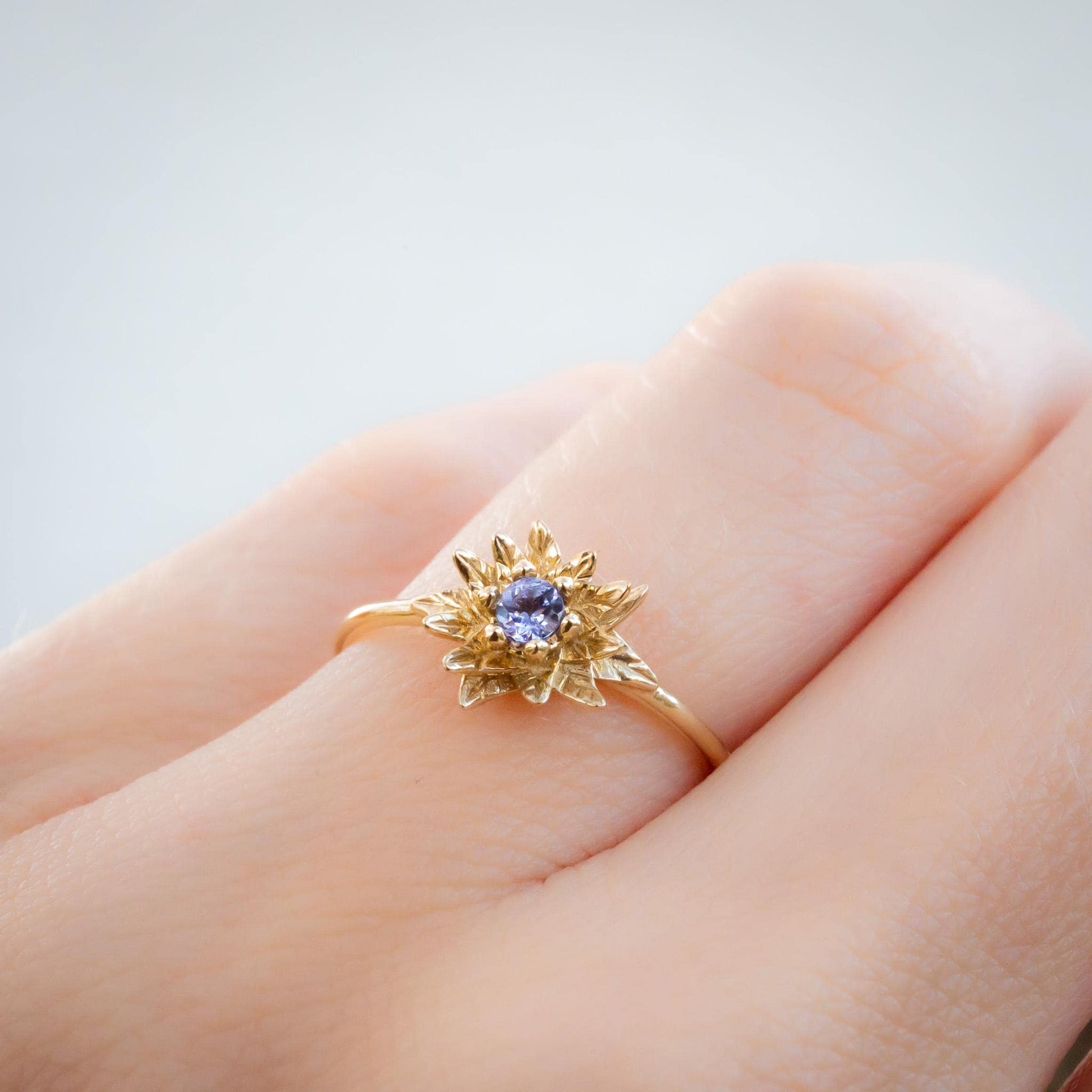 Solid Gold Poinsettia Birth Flower Ring with Tanzanite – December Birth Flower Jewelry