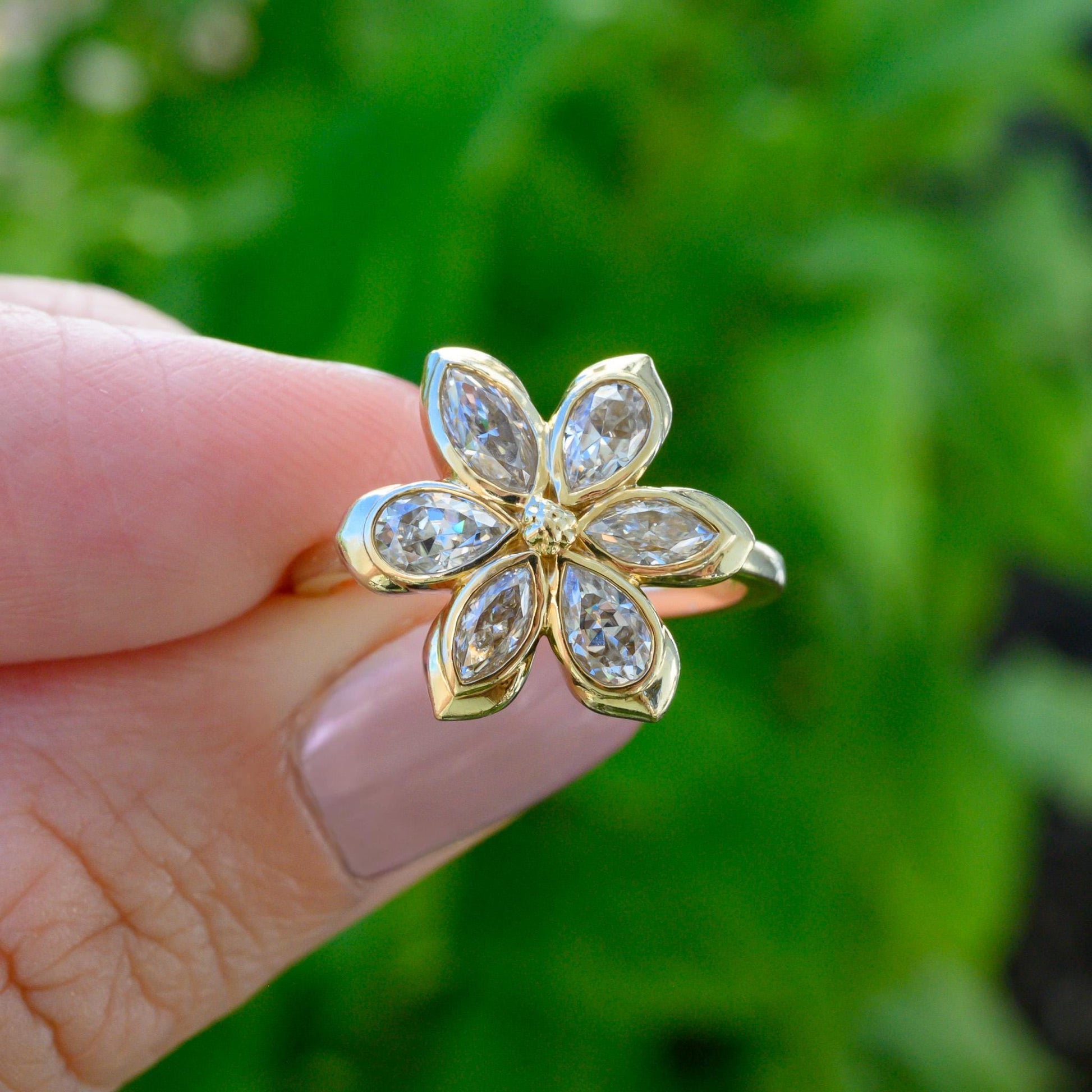 Moissanite Daisy Flower Engagement Ring, 6 marquises and pear-shaped petals with solid gold