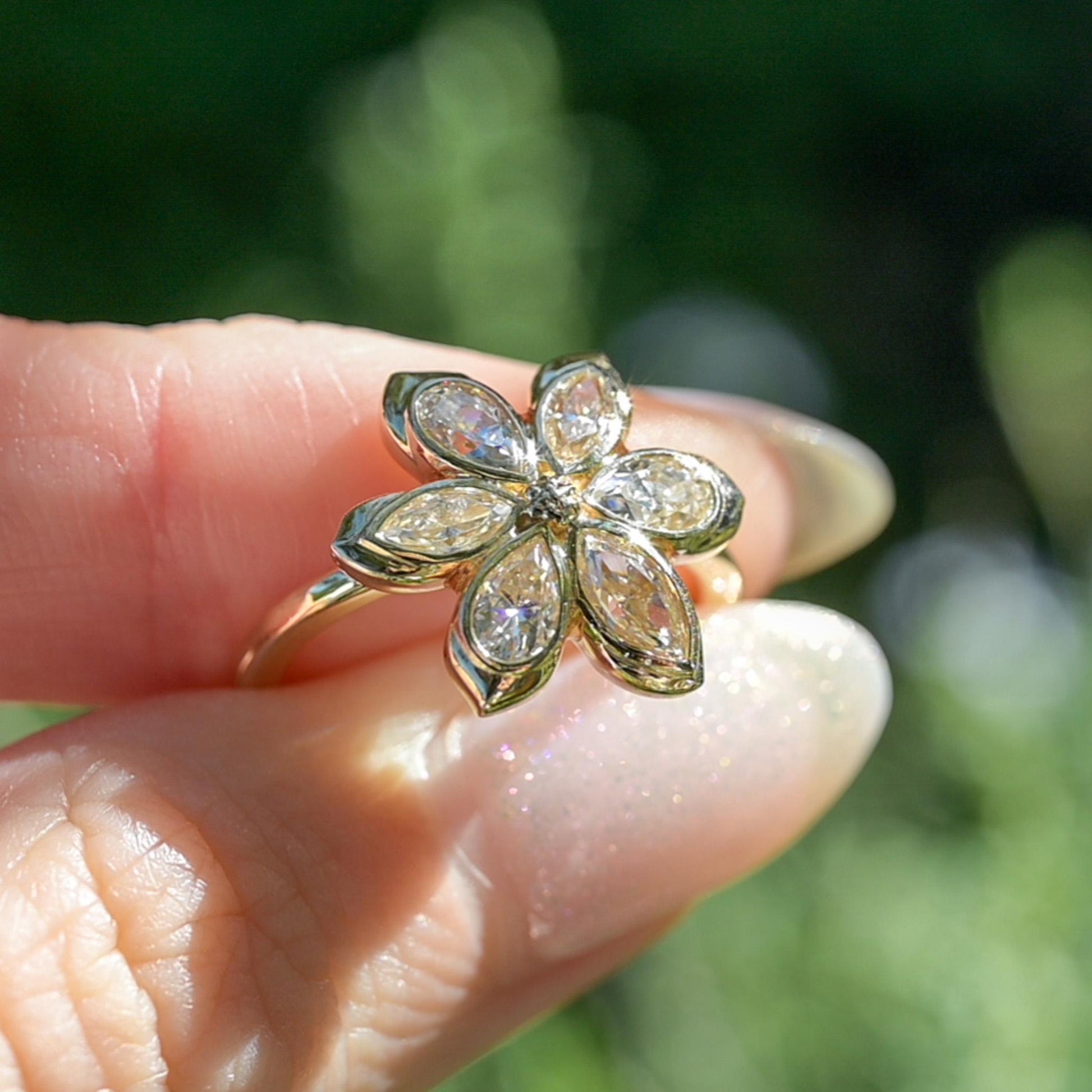 Moissanite Daisy Flower Engagement Ring, 6 marquises and pear-shaped petals with solid gold