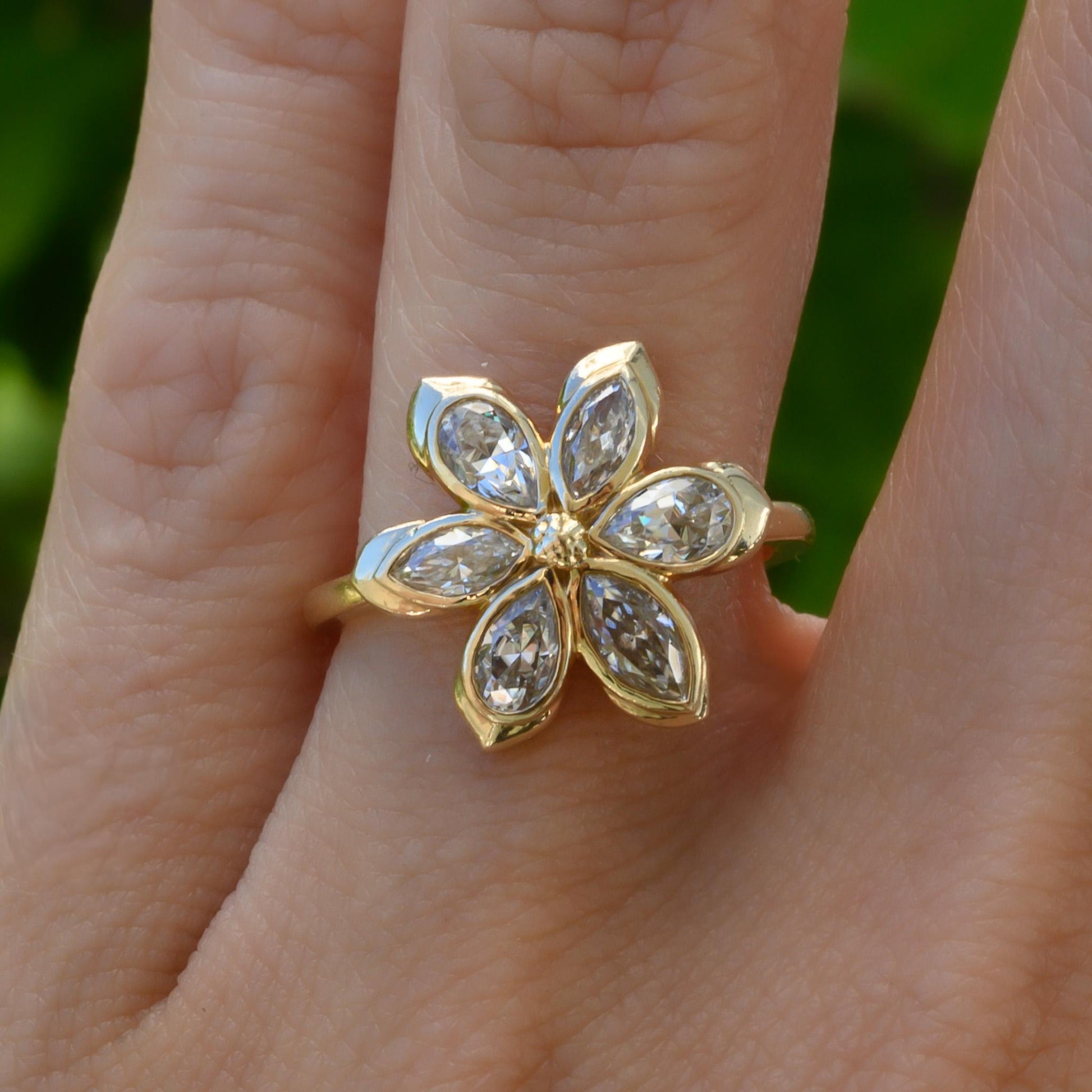 Moissanite Daisy Flower Engagement Ring, 6 marquises and pear-shaped petals with solid gold