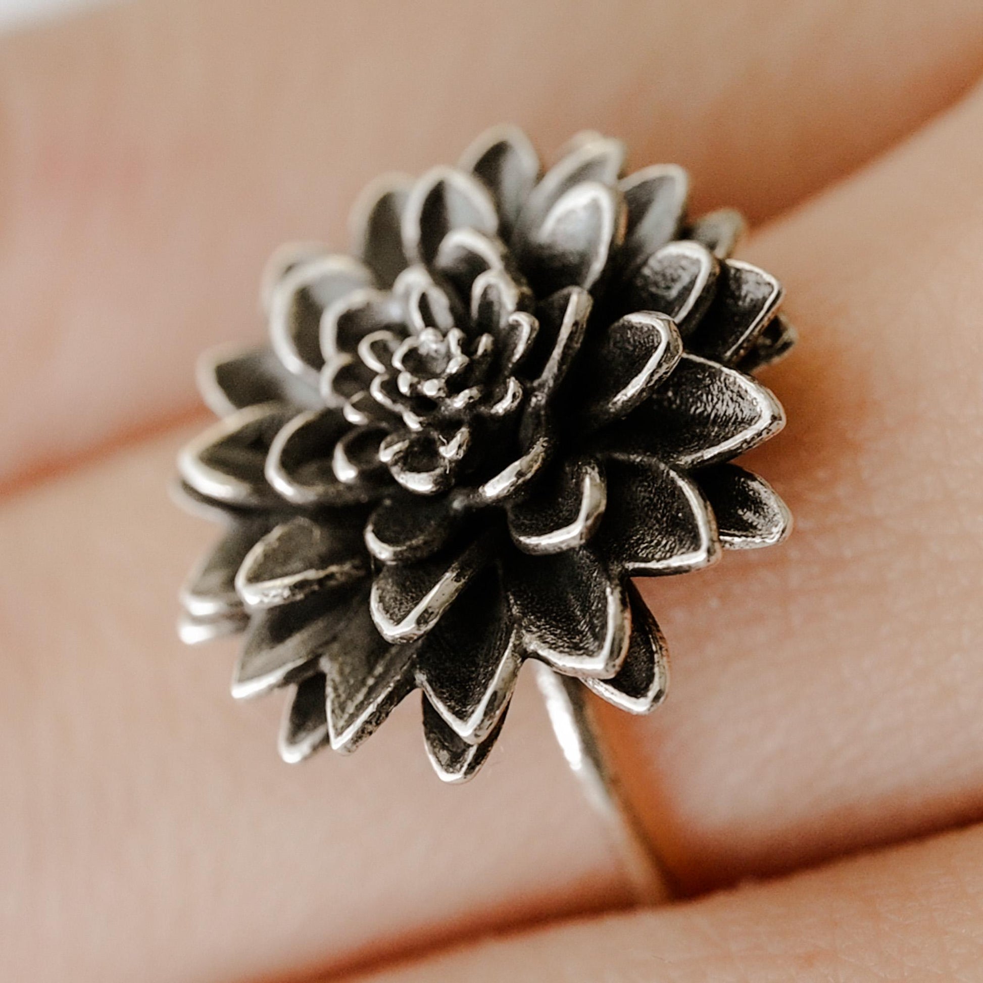 Dahlia flower in antique silver
