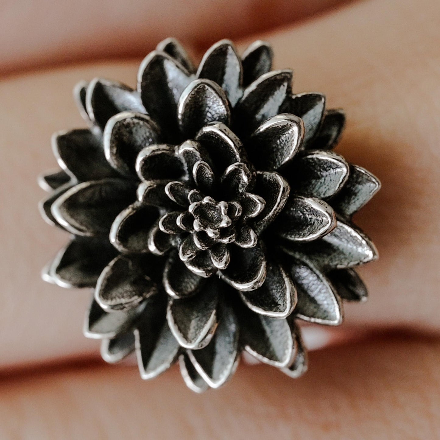 Dahlia flower in antique silver