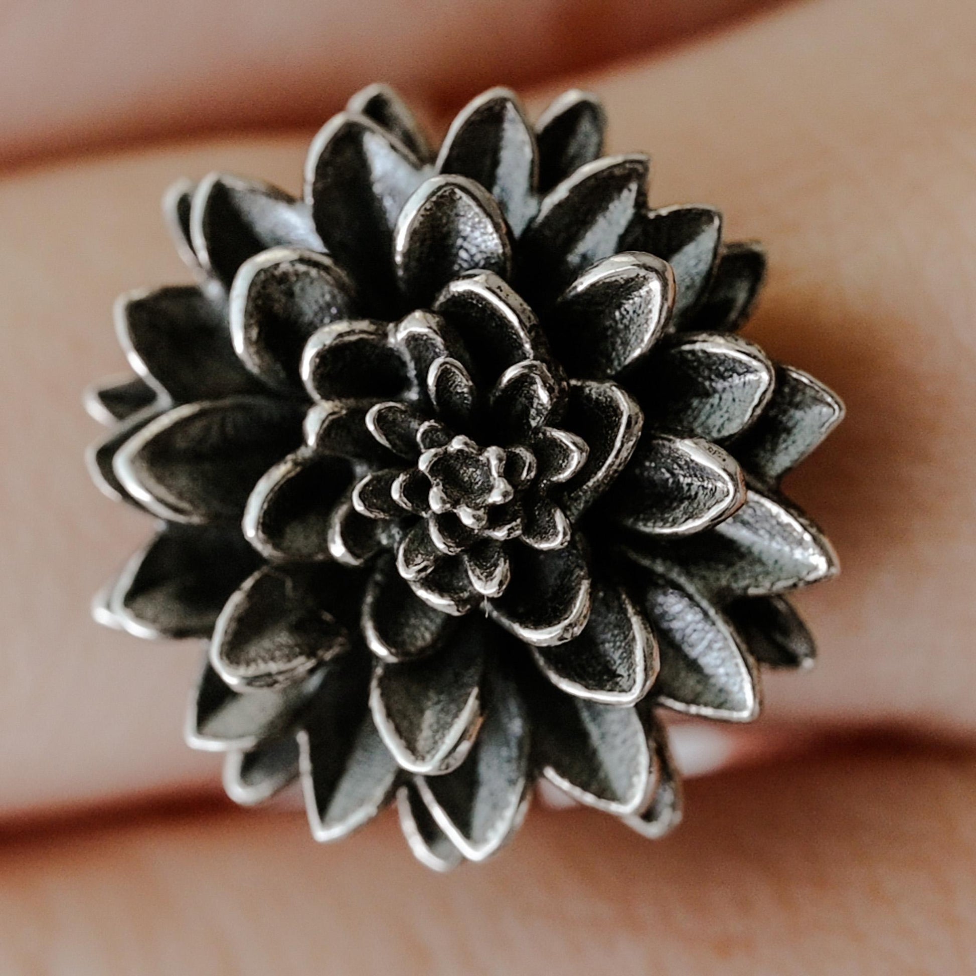 Dahlia flower in antique silver