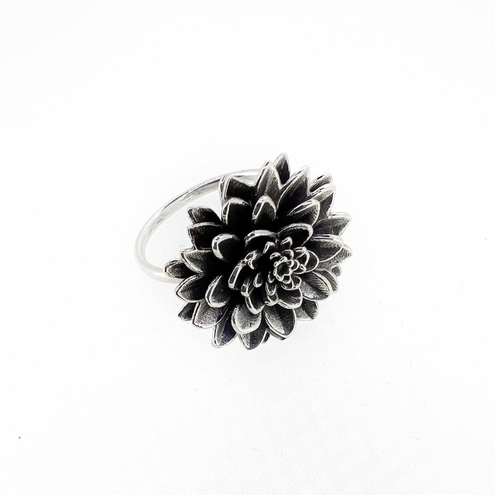 Dahlia flower in antique silver