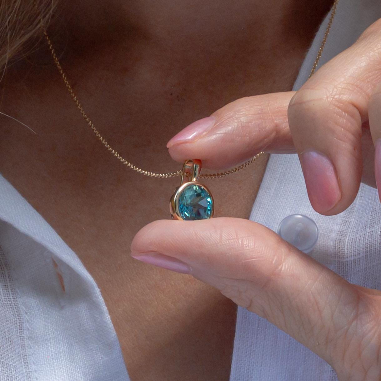 10k Yellow Gold lab Aqua blue sapphire brilliant cut Charm Necklace: Elegant Bezel-Set Pendant