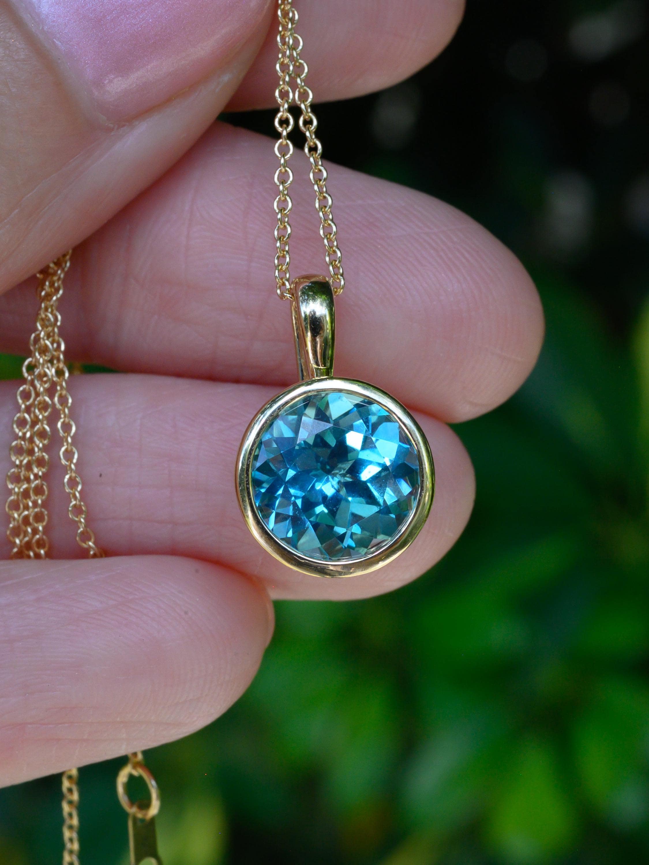 10k Yellow Gold lab Aqua blue sapphire brilliant cut Charm Necklace: Elegant Bezel-Set Pendant