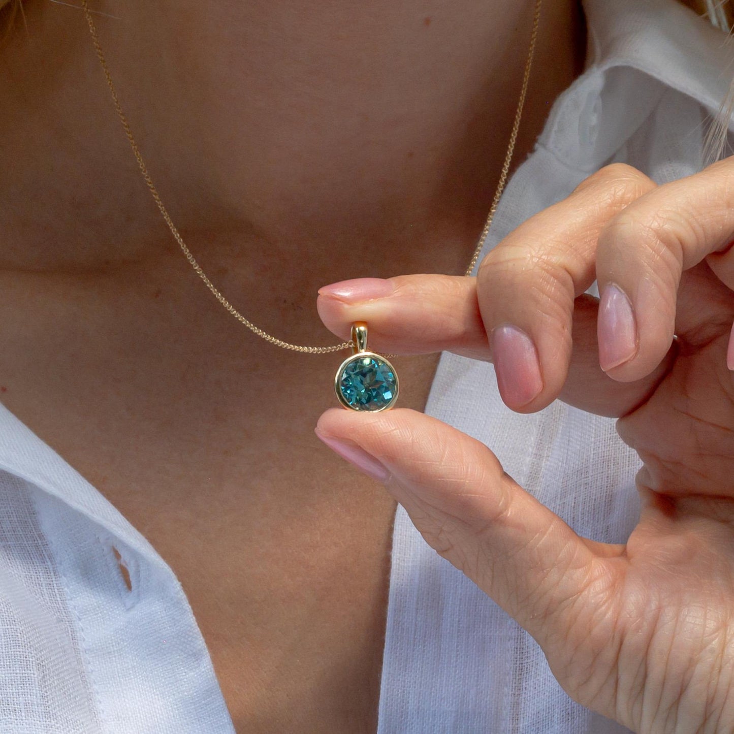 10k Yellow Gold lab Aqua blue sapphire brilliant cut Charm Necklace: Elegant Bezel-Set Pendant