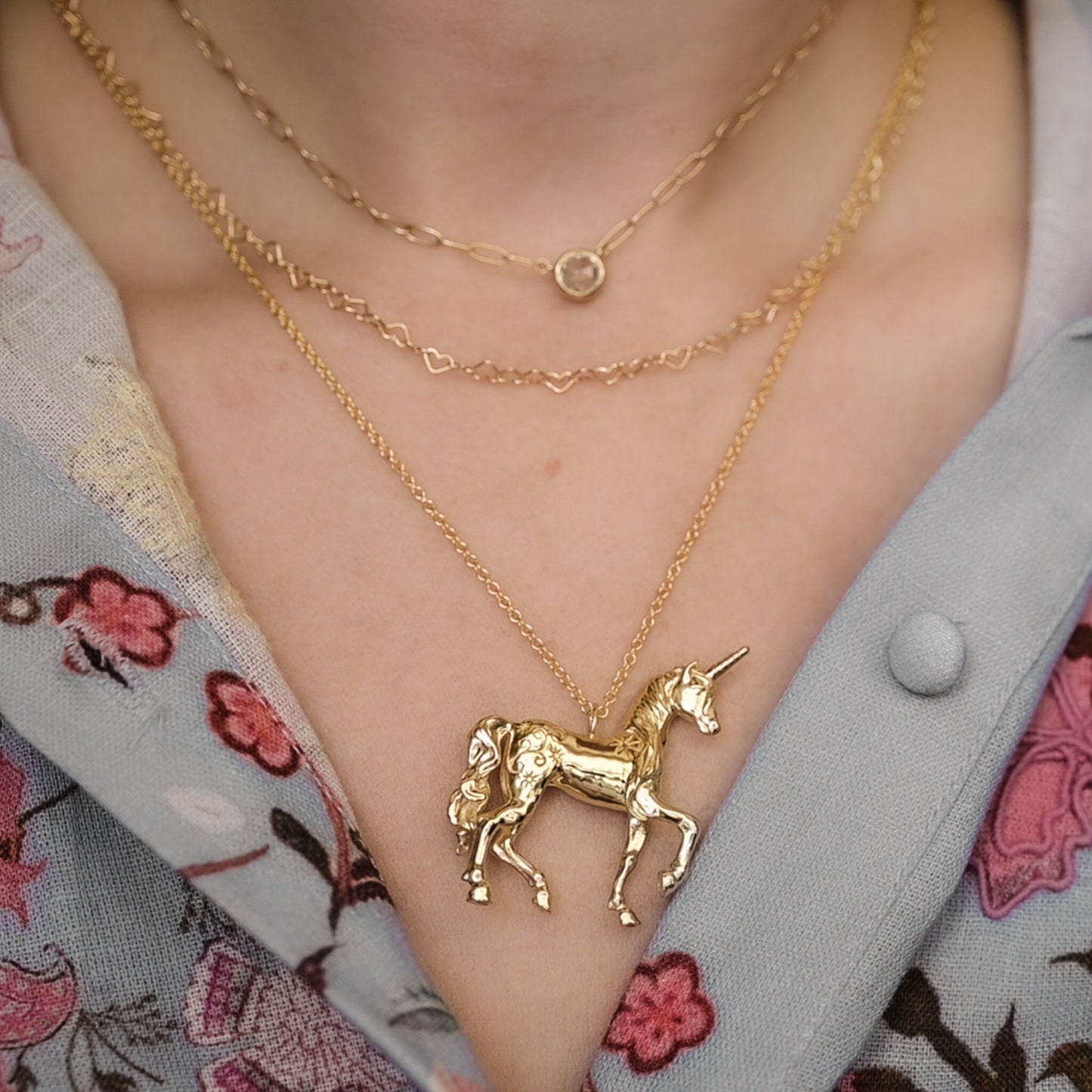 The last unicorn pendant necklace in 18k gold plate with gold fill chain.